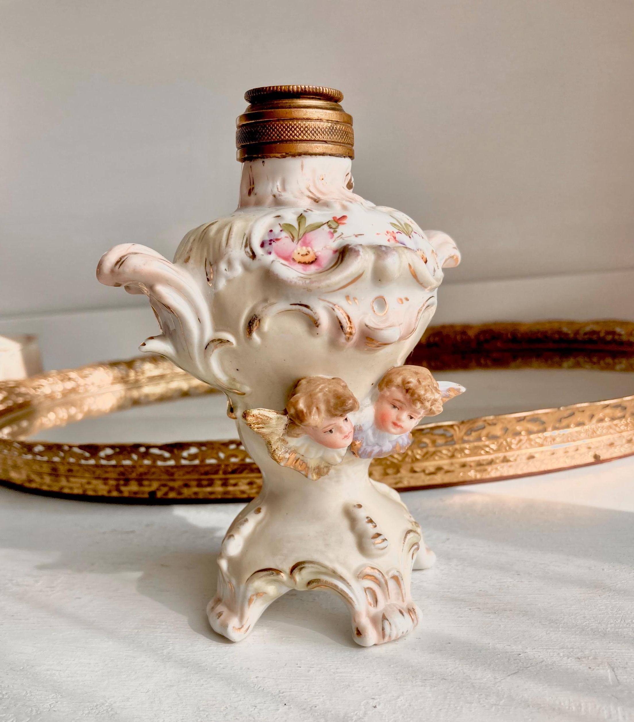Vintage Cherub Perfume Bottle: Ornate Porcelain, Hand-Painted Victorian Motifs