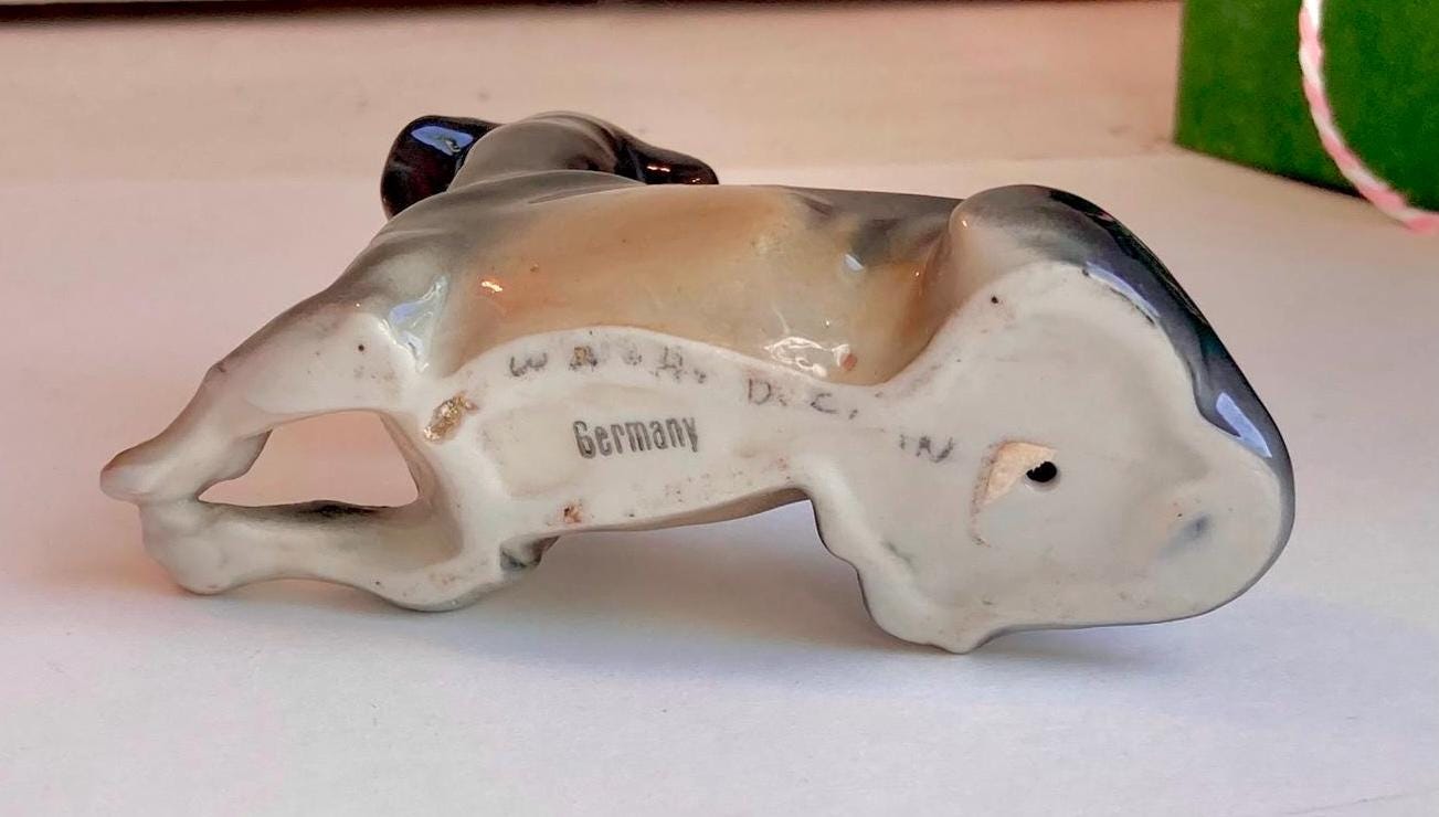 Vintage German-made Ceramic Dog Figurine - Hand painted Lifelike reclining Dacshund