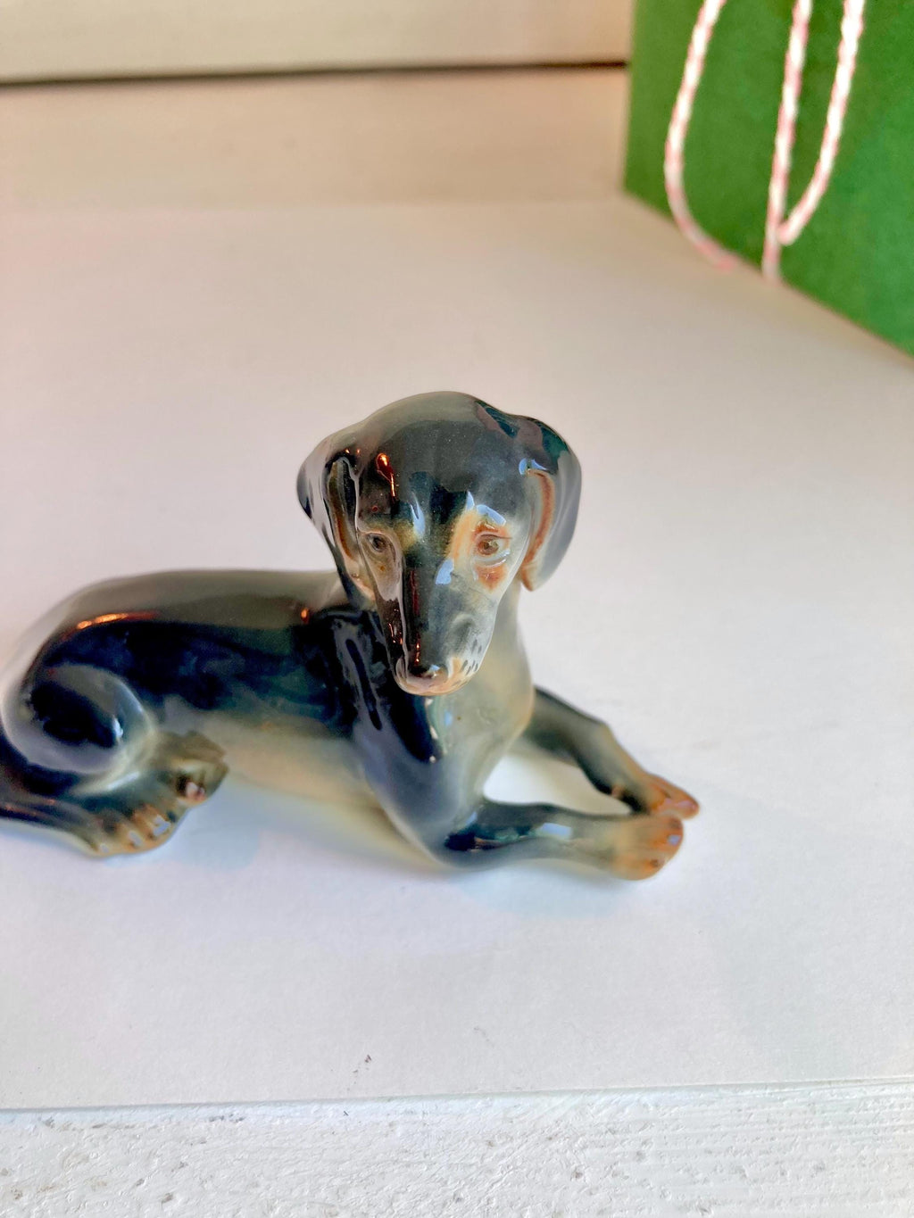 Vintage German-made Ceramic Dog Figurine - Hand painted Lifelike reclining Dacshund