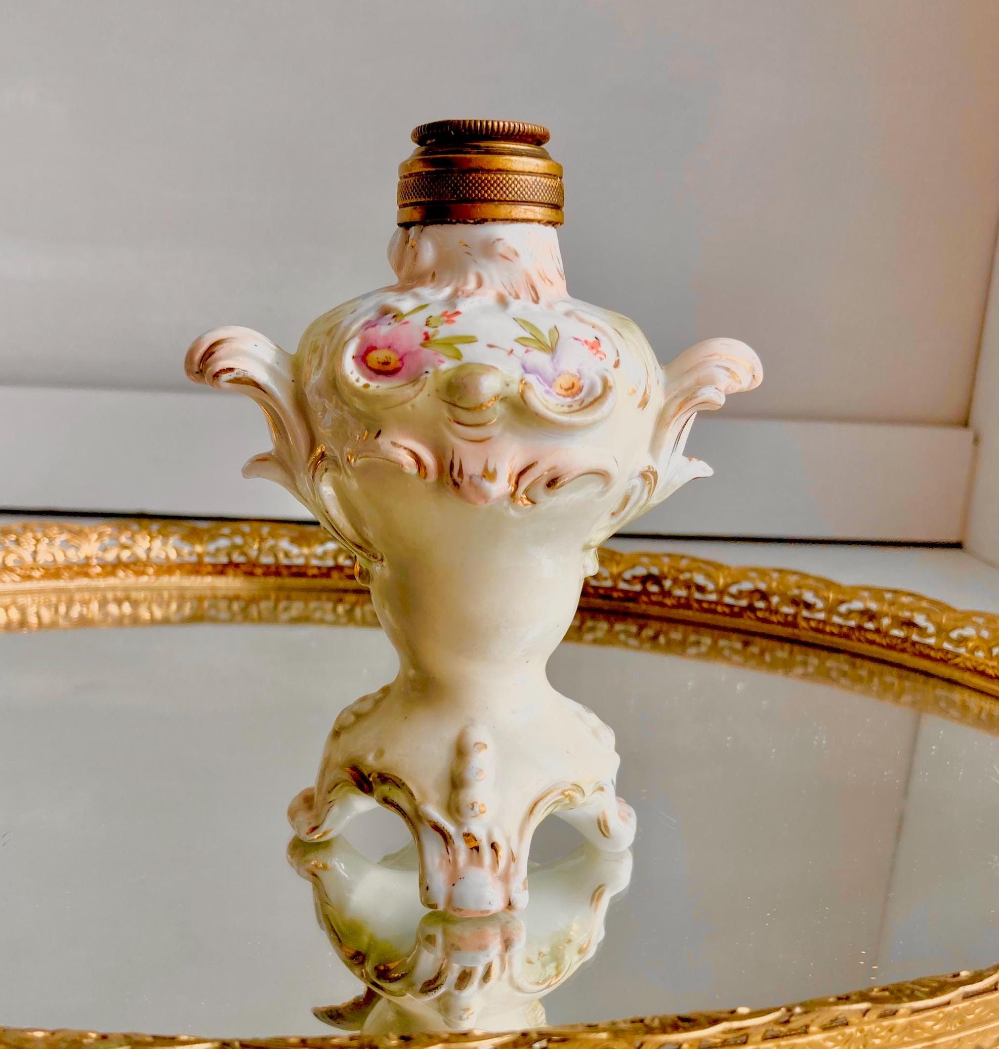 Vintage Cherub Perfume Bottle: Ornate Porcelain, Hand-Painted Victorian Motifs