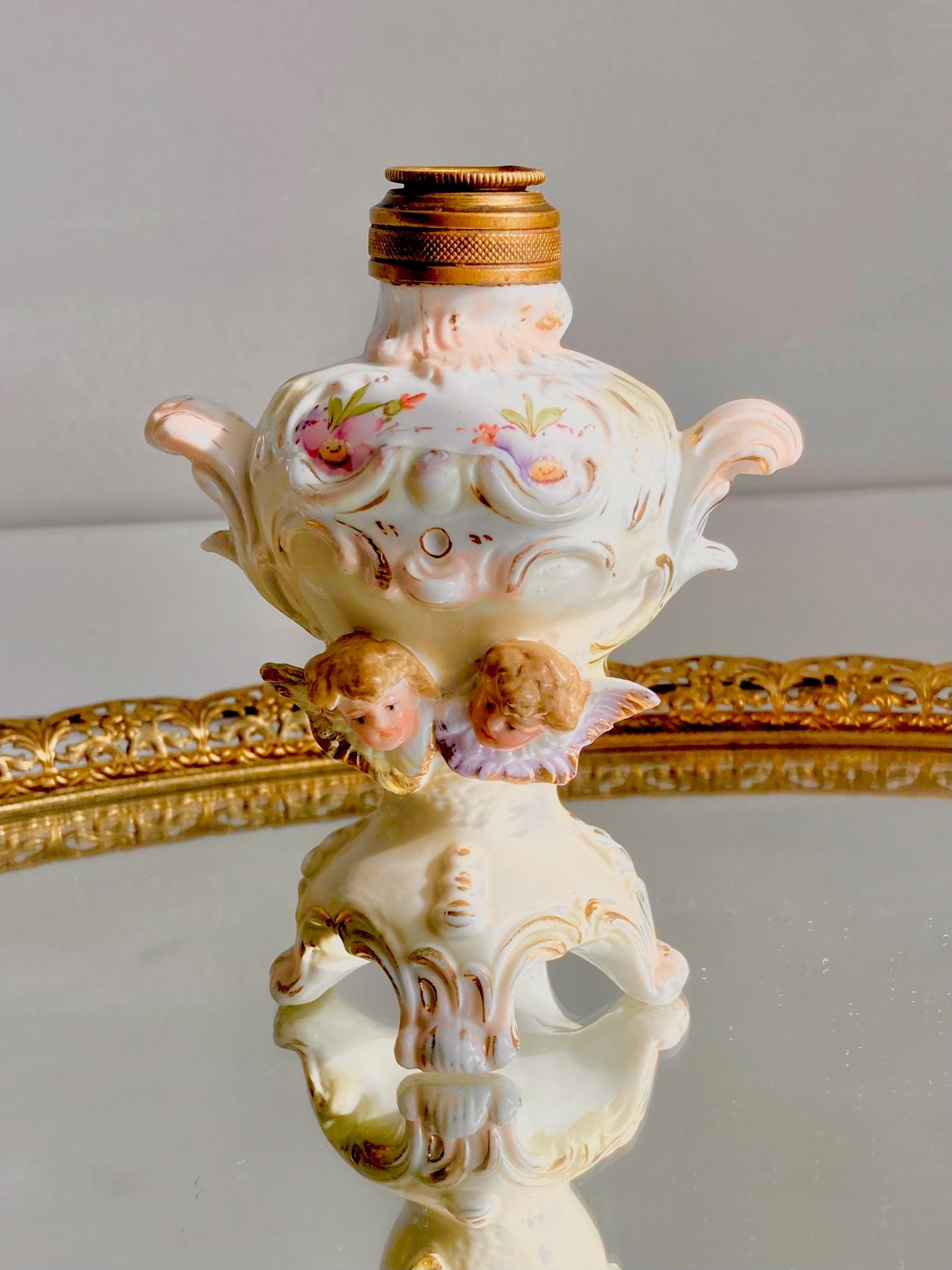 Vintage Cherub Perfume Bottle: Ornate Porcelain, Hand-Painted Victorian Motifs