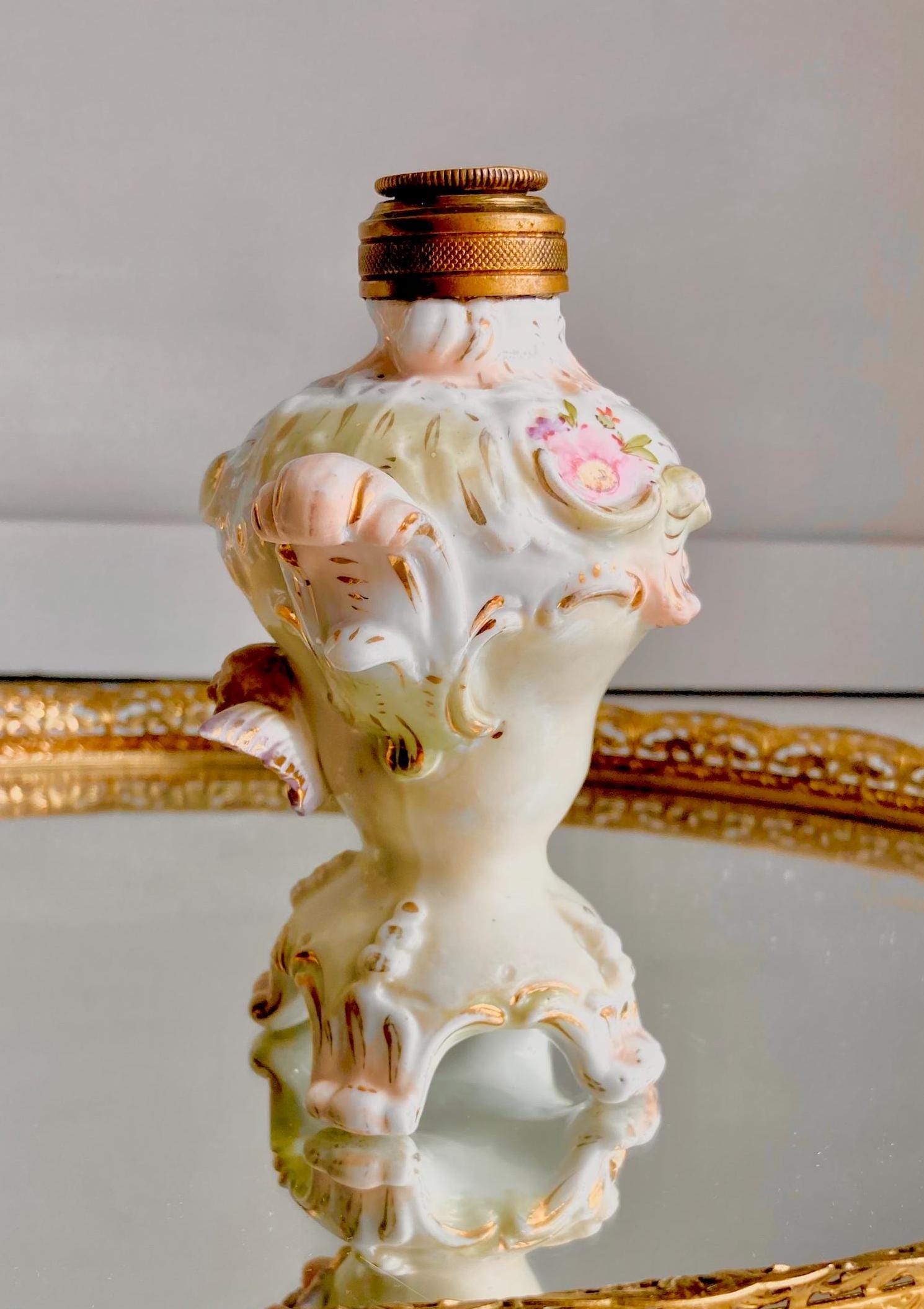 Vintage Cherub Perfume Bottle: Ornate Porcelain, Hand-Painted Victorian Motifs