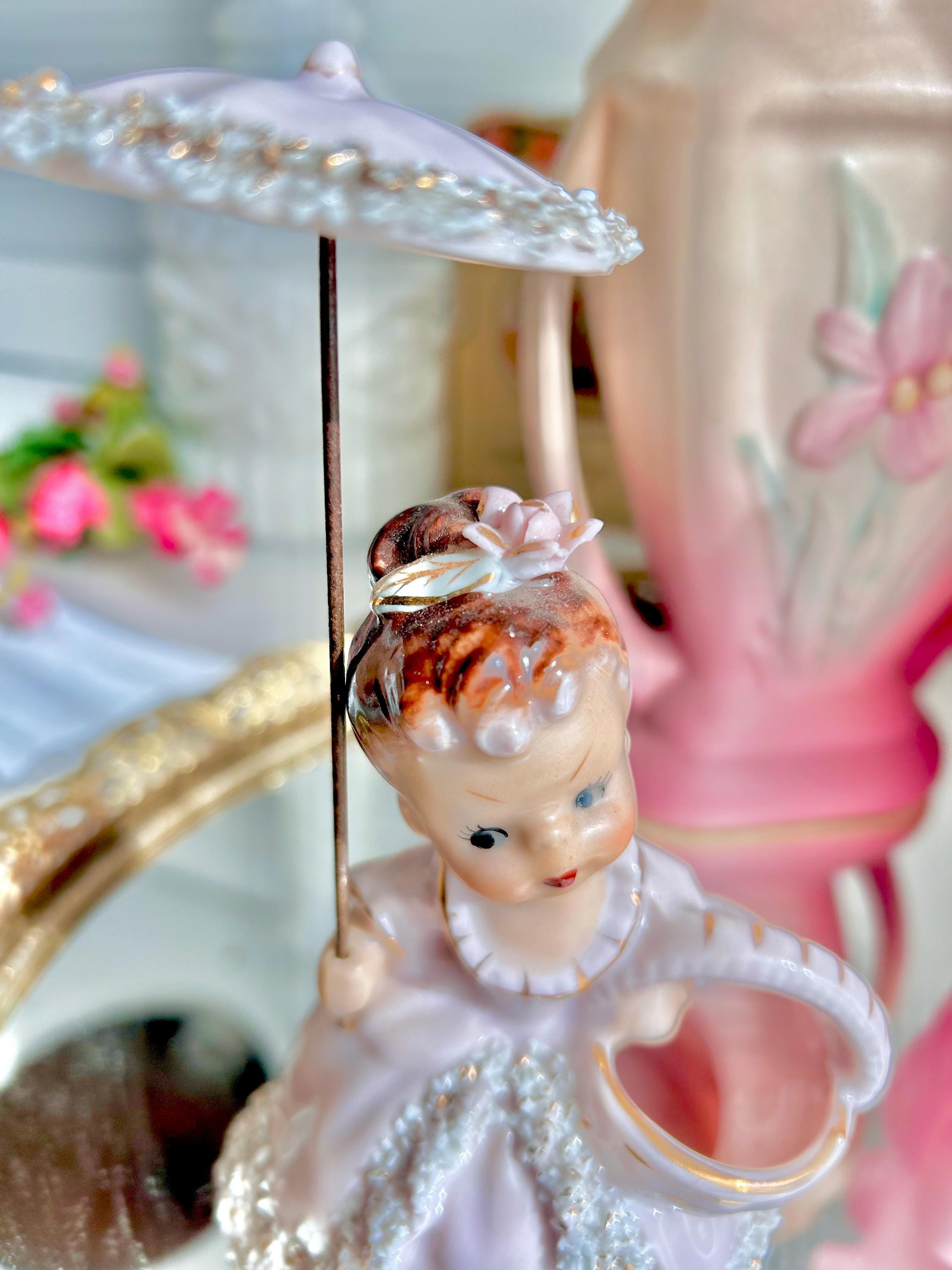 Vintage Spaghetti Porcelain Girl Figurine: Pink Dress, Parasol, Basket Vase (Hairline Crack)