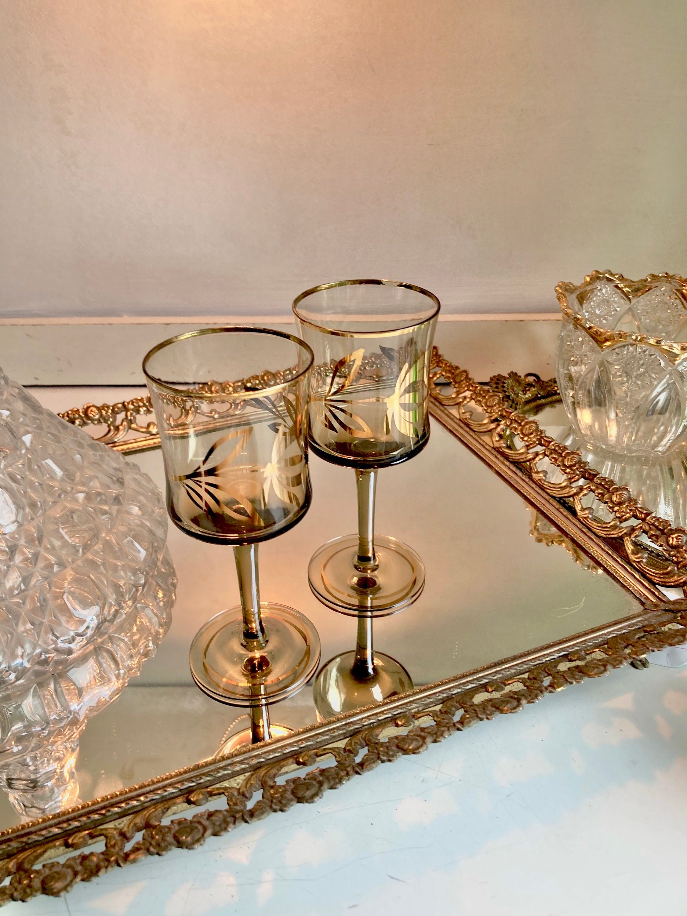 Pair of Bohemian Smoke Glass Cordials with Gilt Floral trim - Vintage Stemware